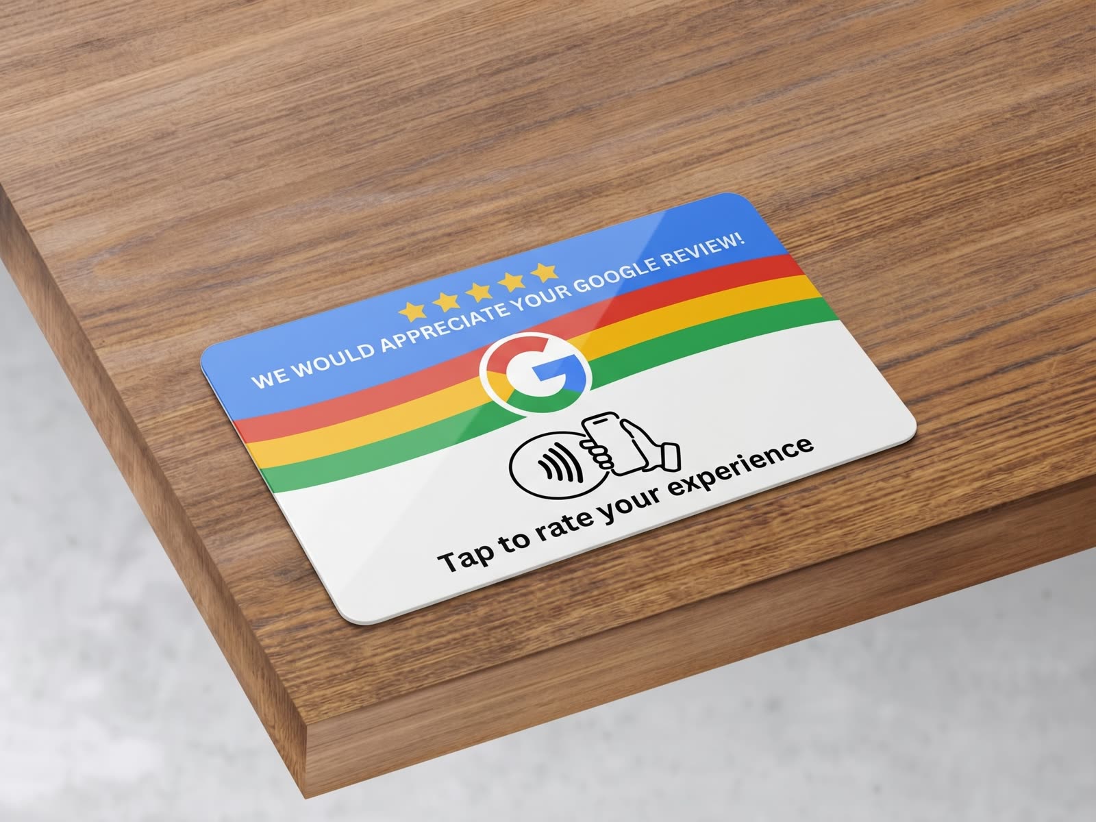 A RetentionWell review card on a wooden desk, reading ‘Tap to rate your experience’